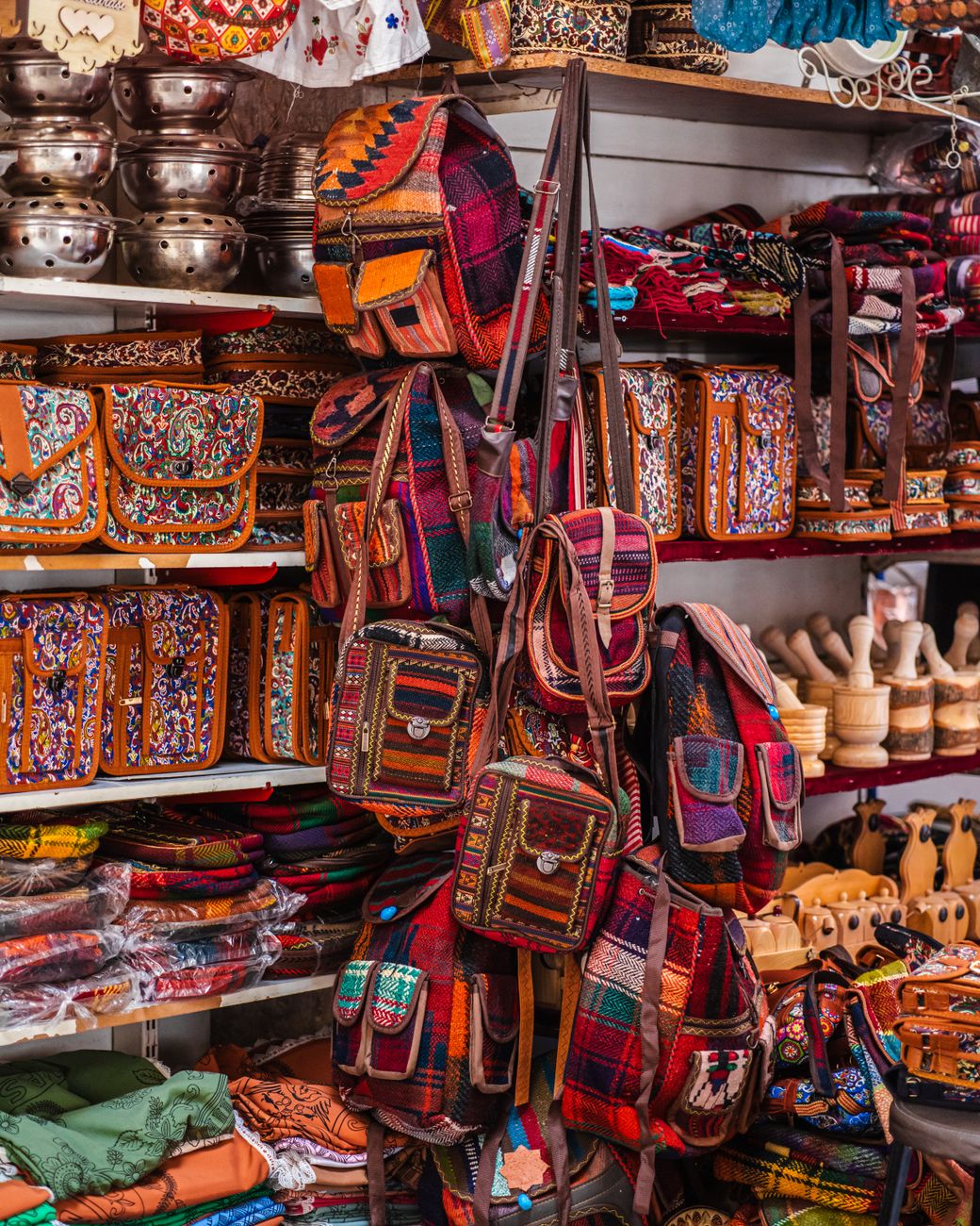 colorful handmade bags and backpacks at souvenir store