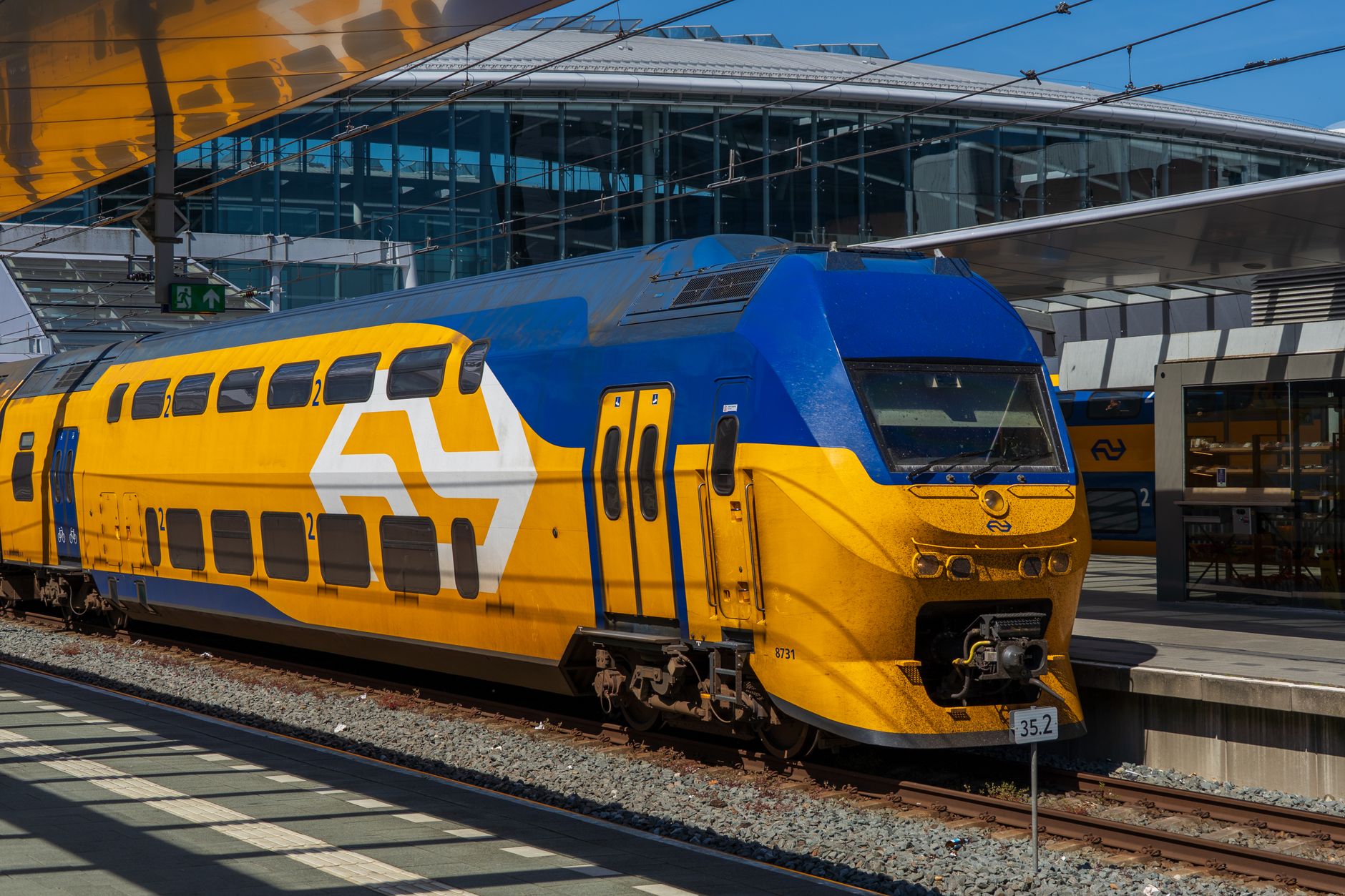 dutch intercity train at a modern railway station